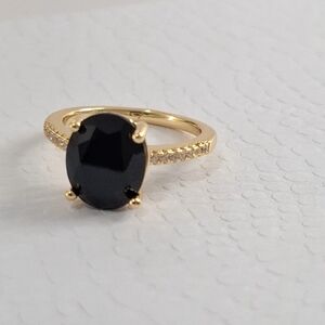 Black onyx oval shape diamond cut ring